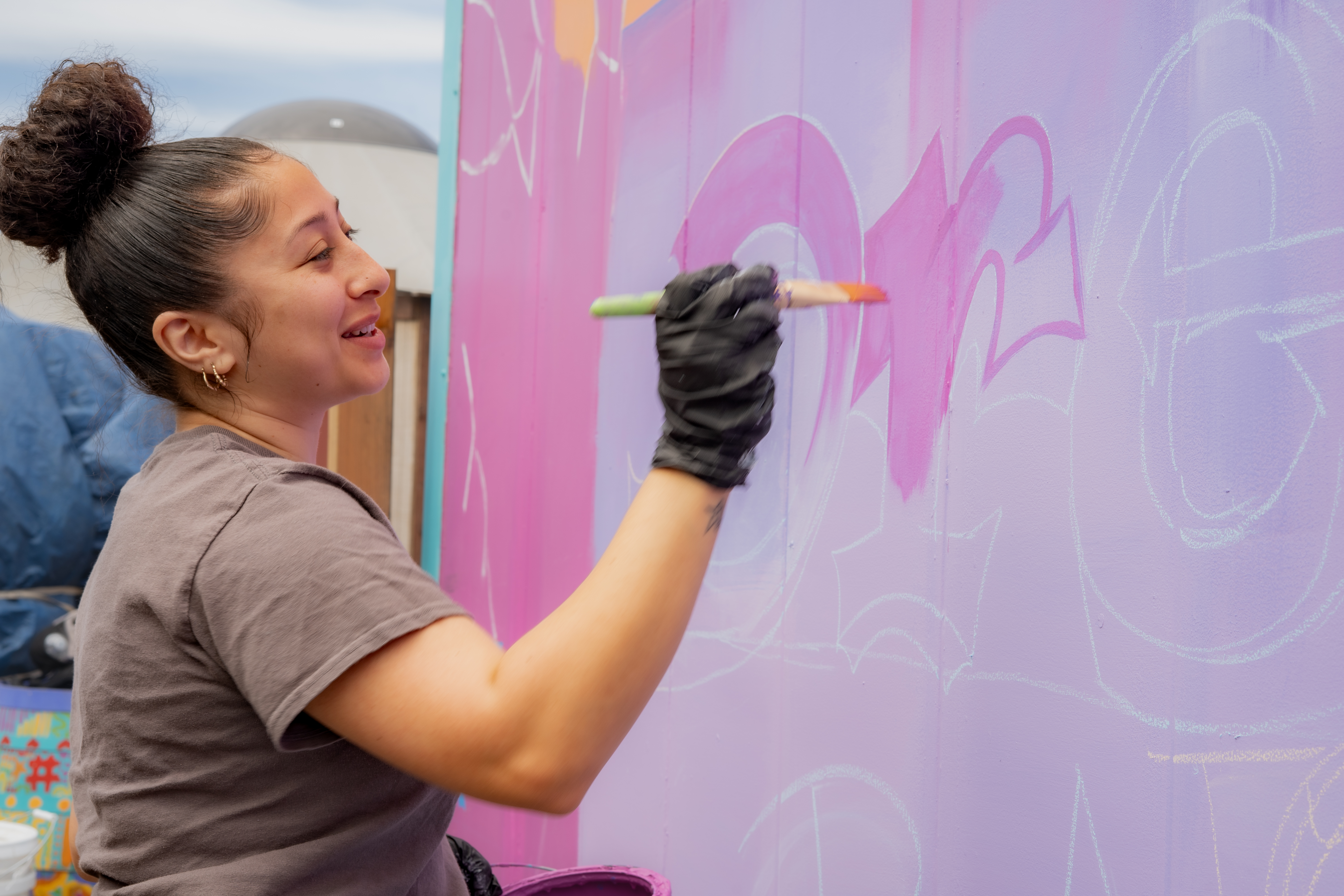 Tiny house village with painted structures and community space